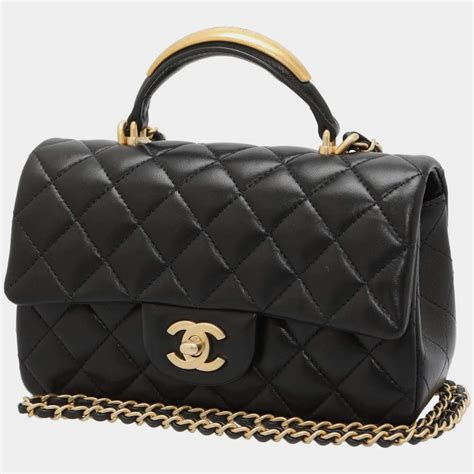 chanel mini flap bag top handle black|chanel mini flap sotheby's.